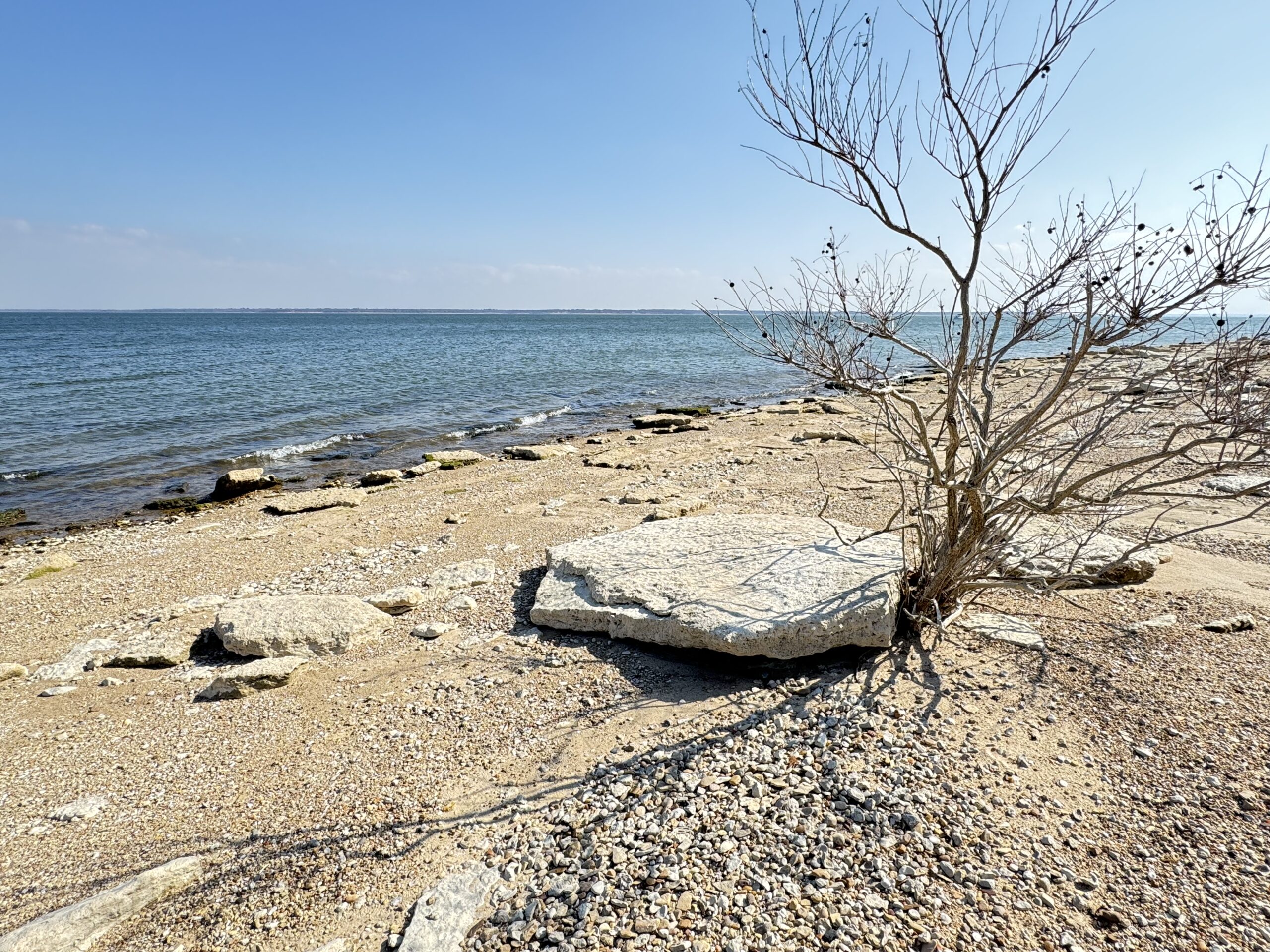 A stunning waterfront home in Denison, Texas, featuring a private dock and breathtaking views of Lake Texoma.